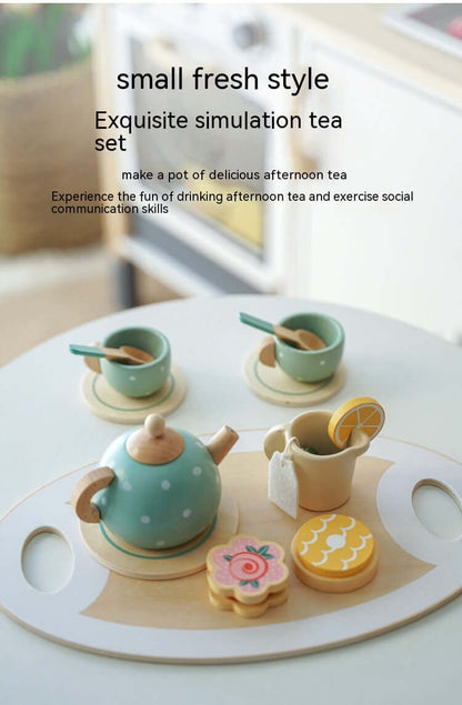 Wooden tea set for children with pot, cups, and dessert toys on a tray, ideal for early education and pretend play.